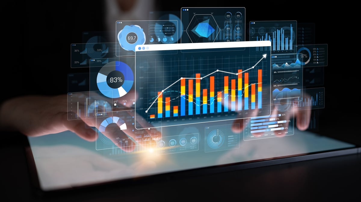 Hands Engaging with Digital Tablet Displaying Dynamic Graphs and Data Visualizations in a Modern Analytical Workspace Environment Sigmoid